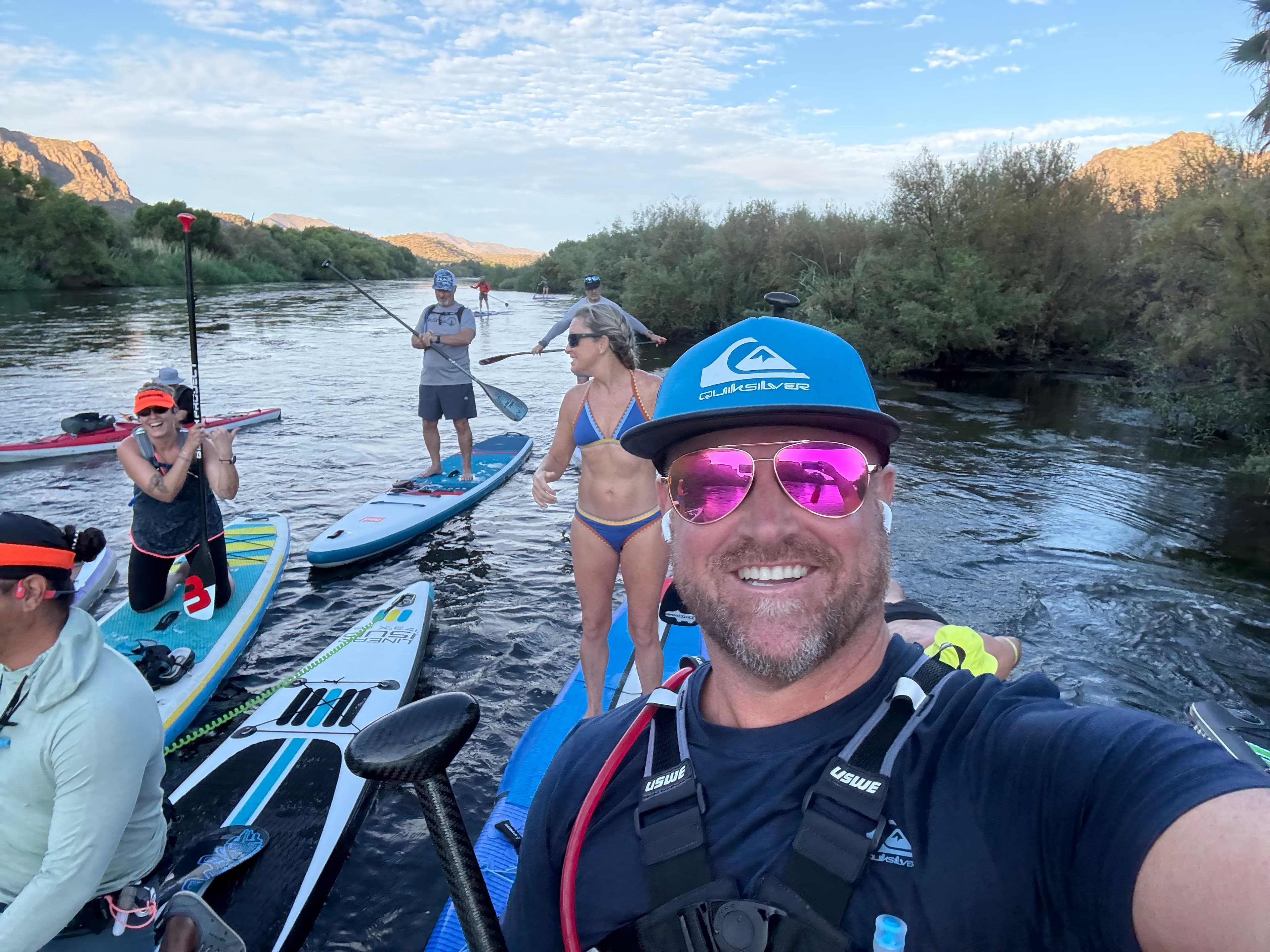 Arizona SUP Academy paddlers on the Salt River canyon at golden hour